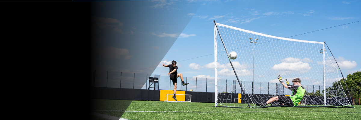 Footballer scoring in a KICKSTER Elite goal