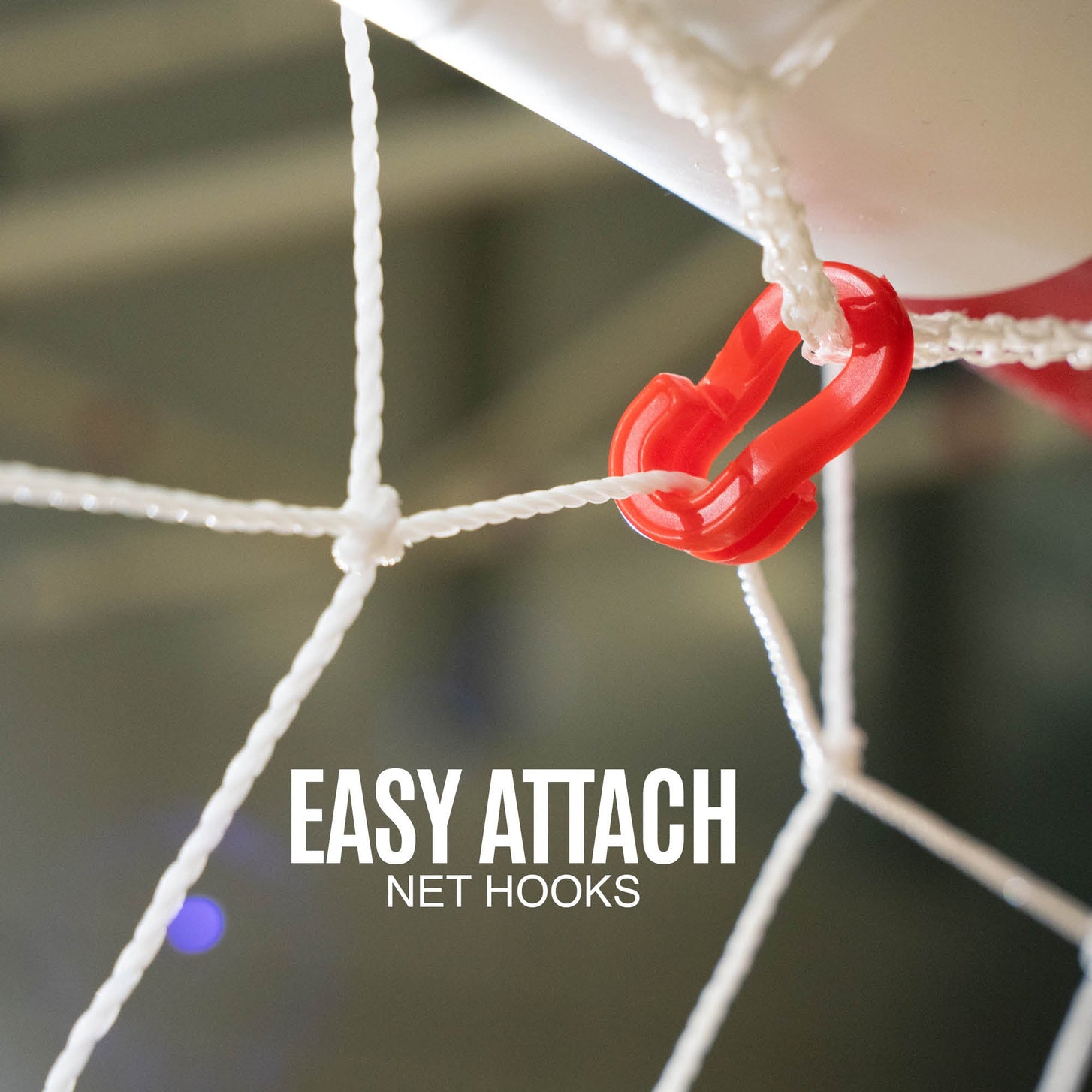Q-FOLD Handball Goal 300 x 200 cm close-up of a red net hook on the white frame, with the text "Easy attach net hooks".