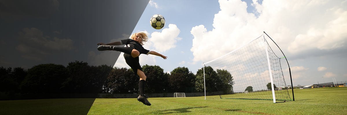 Footballer shooting at a KICKSTER goal