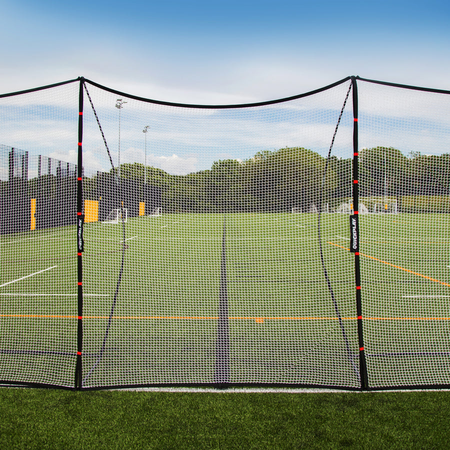 Extender Net 240 x 270 cm from the front: the white net section between two black poles with red marks, on an artificial pitch.