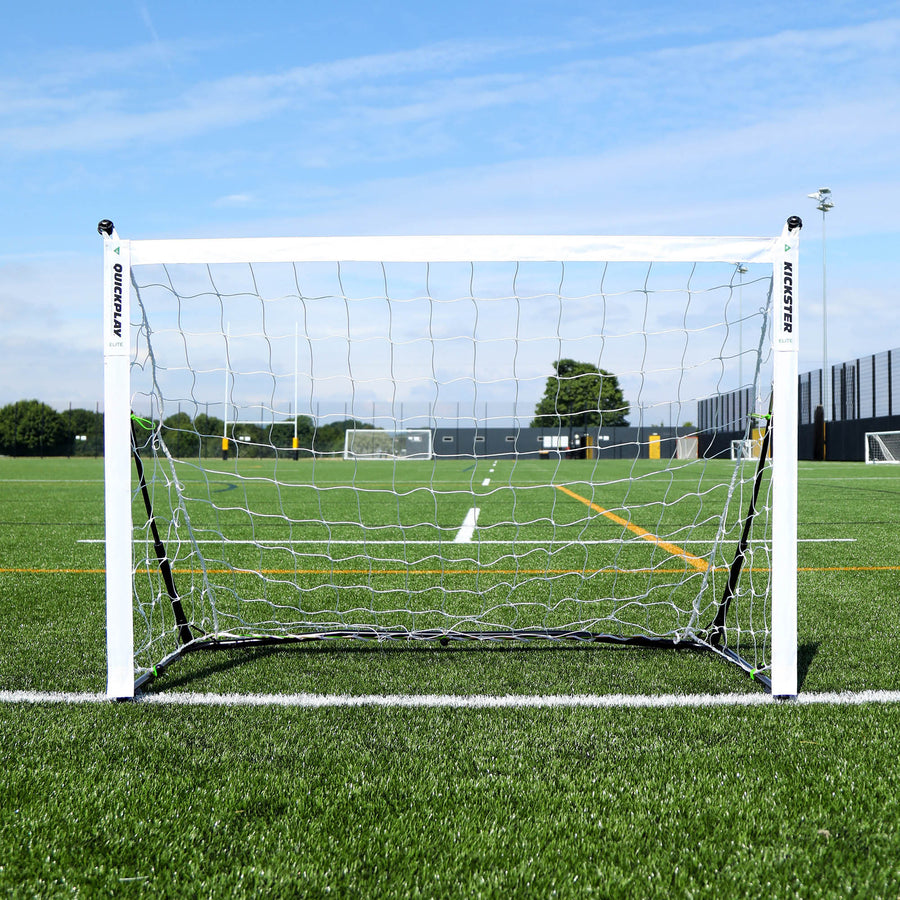 KICKSTER Elite 150 x 100 cm goal from the front, with a white net, on the line of an artificial pitch.