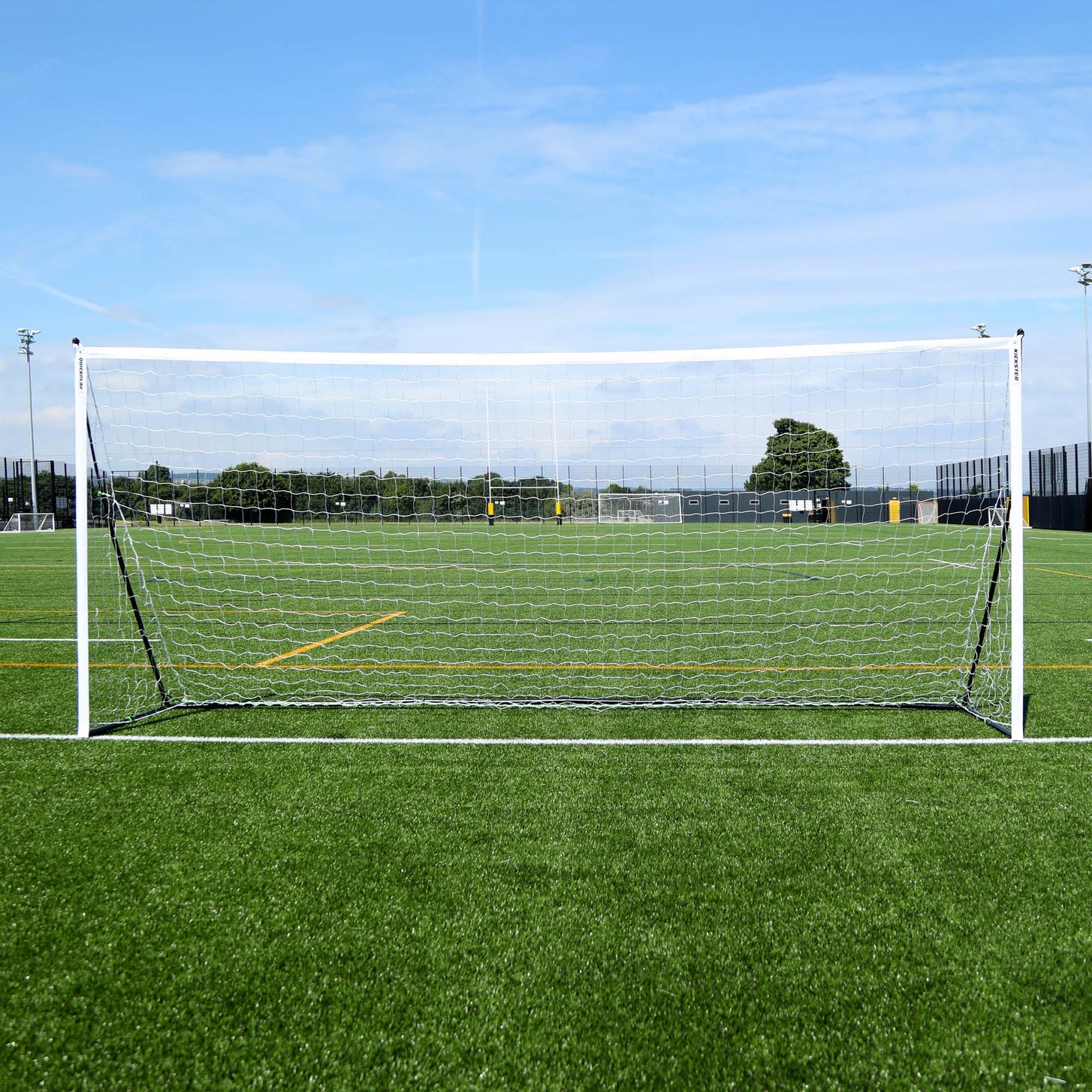 KICKSTER Elite 500 x 200 cm goal from the front on an artificial pitch, white frame and white net.