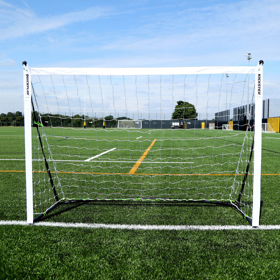 KICKSTER Elite 180 x 120 cm goal from the front on an artificial pitch, white frame and white net.