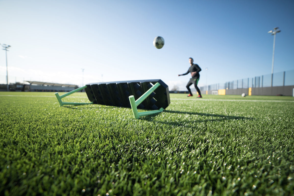 shooting at a football rebounder
