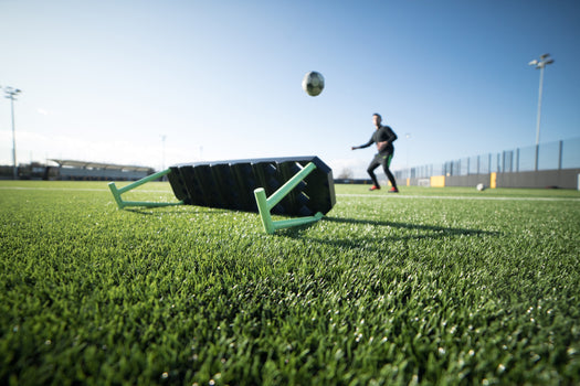 shooting at a football rebounder