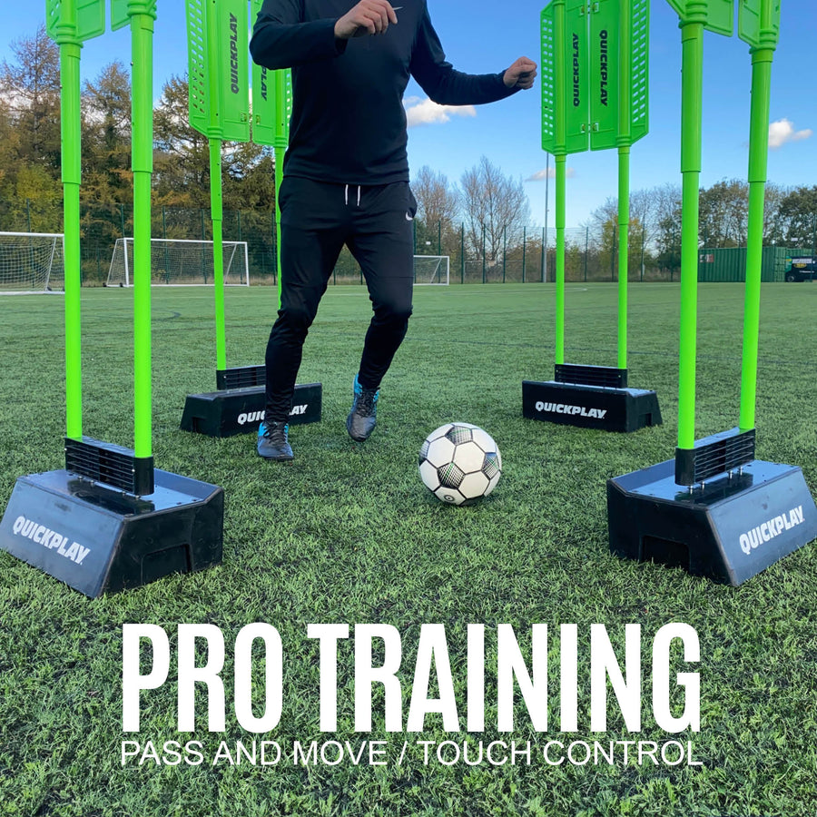 REPLAY Defender & Block System pass and move drill: player with a ball between four mannequins in black bases on artificial grass.